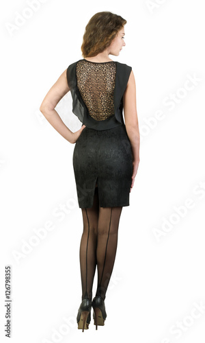 Obraz na płótnie Caucasian woman wearing brown dress standing on isolated background w salonie