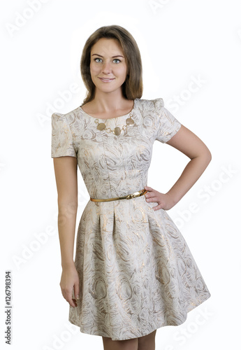 Obraz na płótnie Caucasian woman wearing brown dress standing on isolated background w salonie