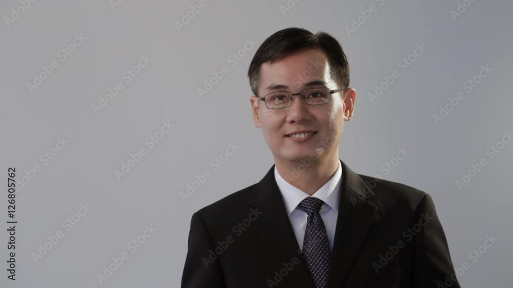 MS TU Businessman holding folder and looking at camera MS TU Businessman holding folder and looking at camera