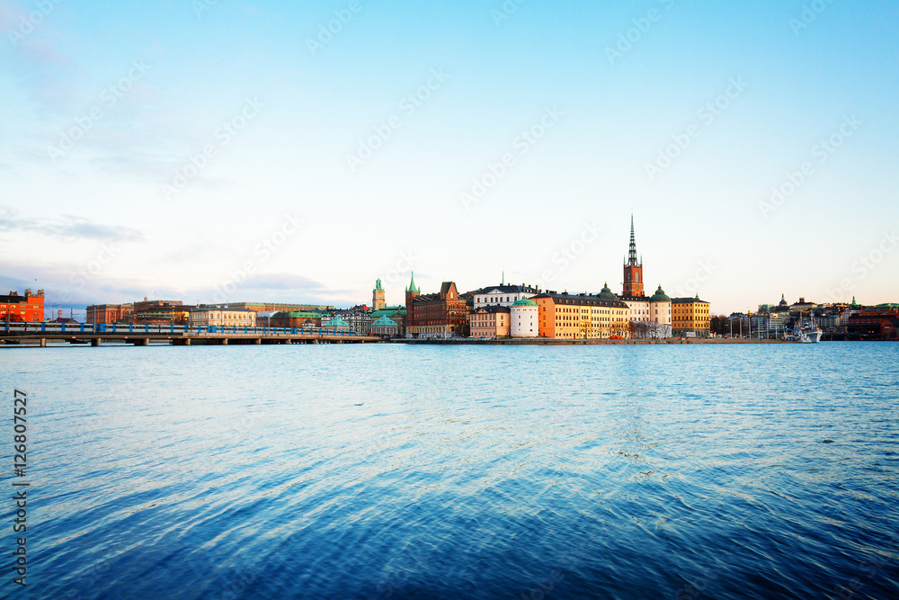 old town of Stockholm and Baltic sea at sunset, Sweden, toned