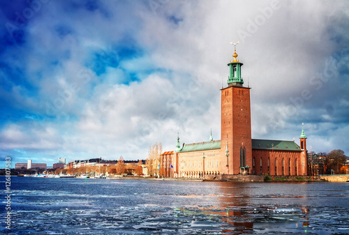 The City Hall Stadshuset in Stockholm with winter ice, Sweden, toned
