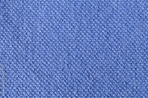 Blue background of fabric, one color, texture of the material