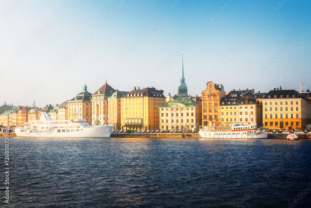 waterfront architecture of old town Gamla Stan in Stockholm, Sweden, toned waterfront architecture of old town Gamla Stan in Stockholm, Sweden, toned