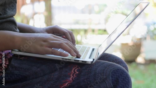Women's hands typing on computer