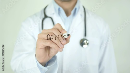 Pathogen , Doctor Writing On Transparent Screen photo