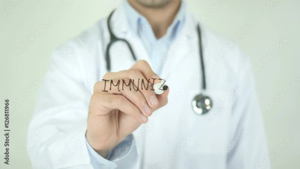 Immunization , Doctor Writing On Transparent Screen Immunization , Doctor Writing On Transparent Screen