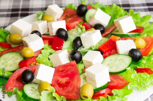 Greek salad on white plate