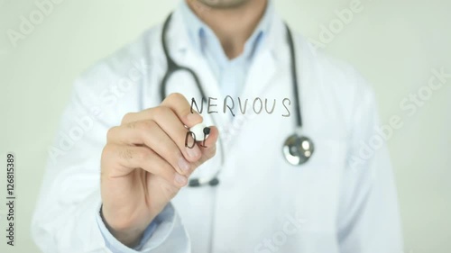 Nervous Disorder , Doctor Writing On Transparent Screen photo