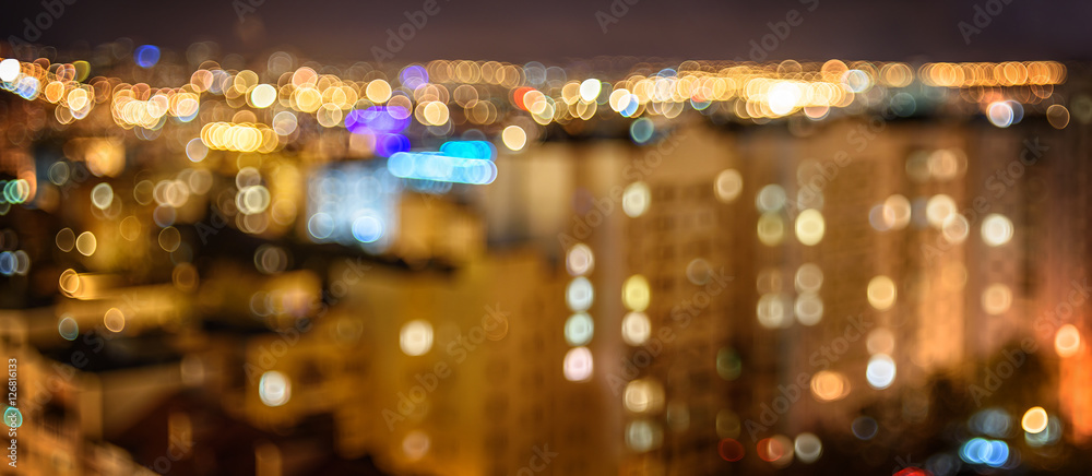 Panorama city lights in the evening blurring background