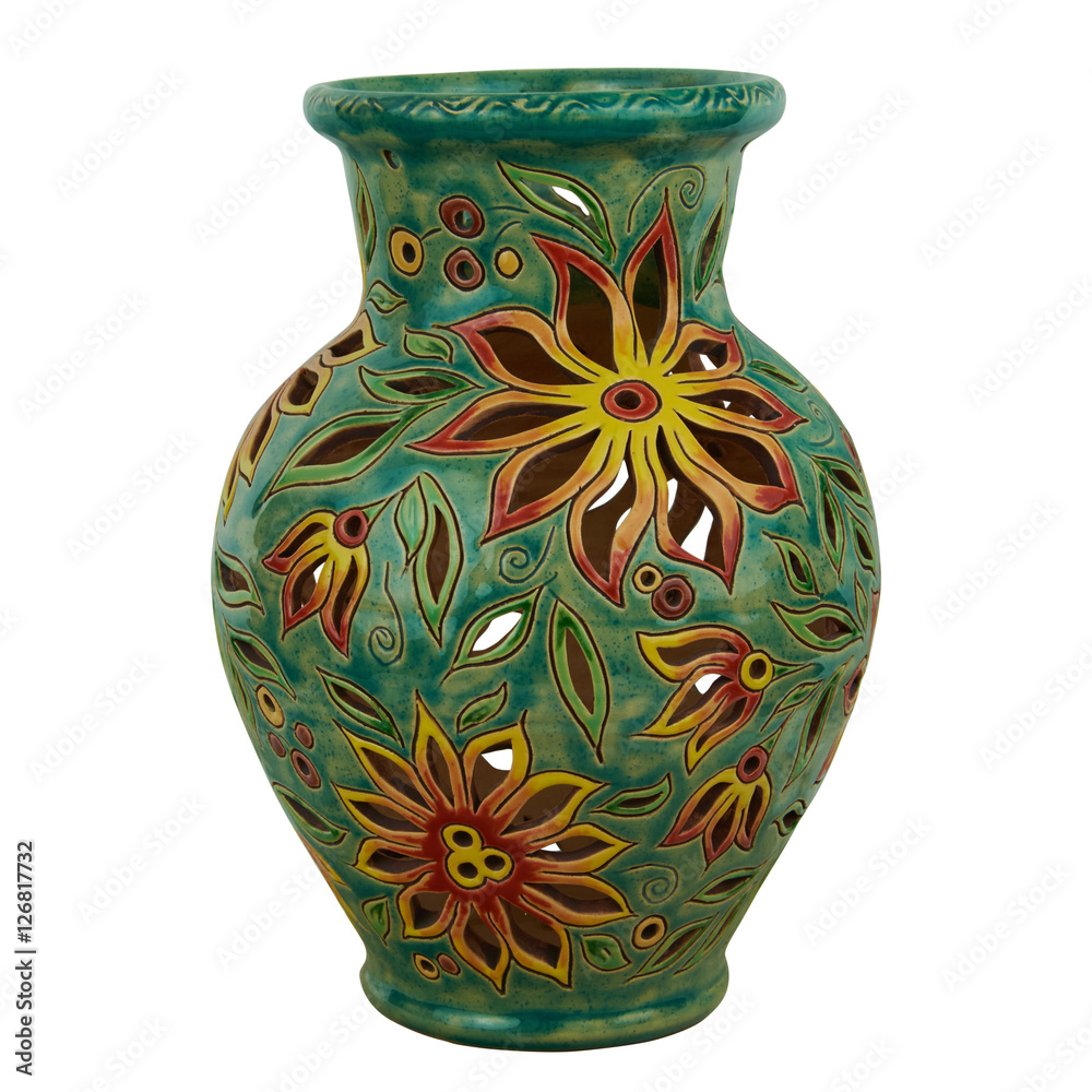 Colorful decorative jug decorated with flowers. Isolated on a wh