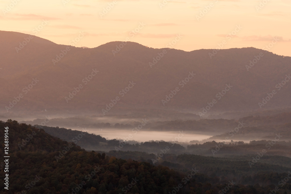 the Blue Ridge Mountains near Roanoke, Virginia, early in the morning with mist in the valleys the Blue Ridge Mountains near Roanoke, Virginia, early in the morning with mist in the valleys