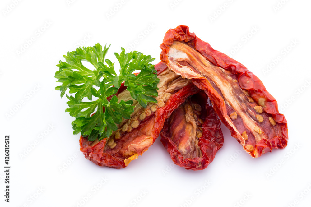 Dried tomatoes isolated on white background.