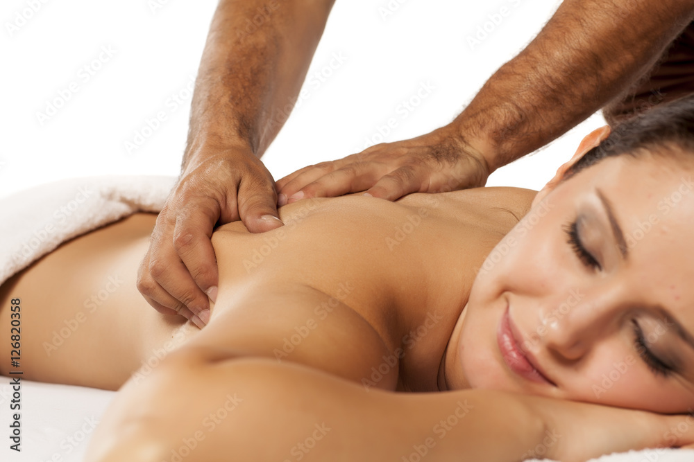 Fototapeta premium young woman enjoys back massage