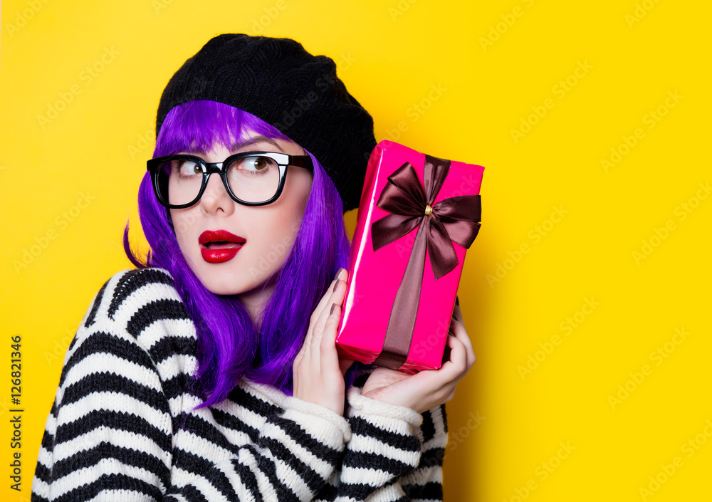 woman in glasses with gift box woman in glasses with gift box