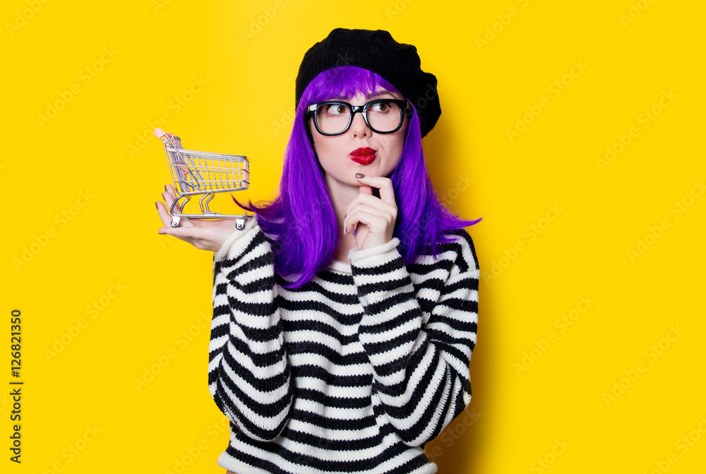 woman with purple hair and shopping cart woman with purple hair and shopping cart