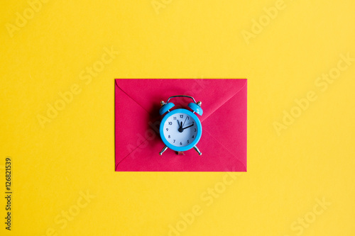 Christmas alarm clock and red envelope