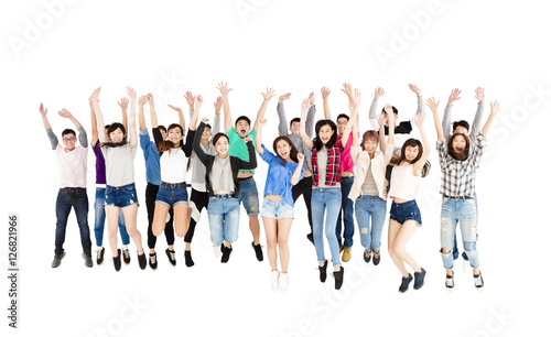 Happy young group jumping people isolated on white