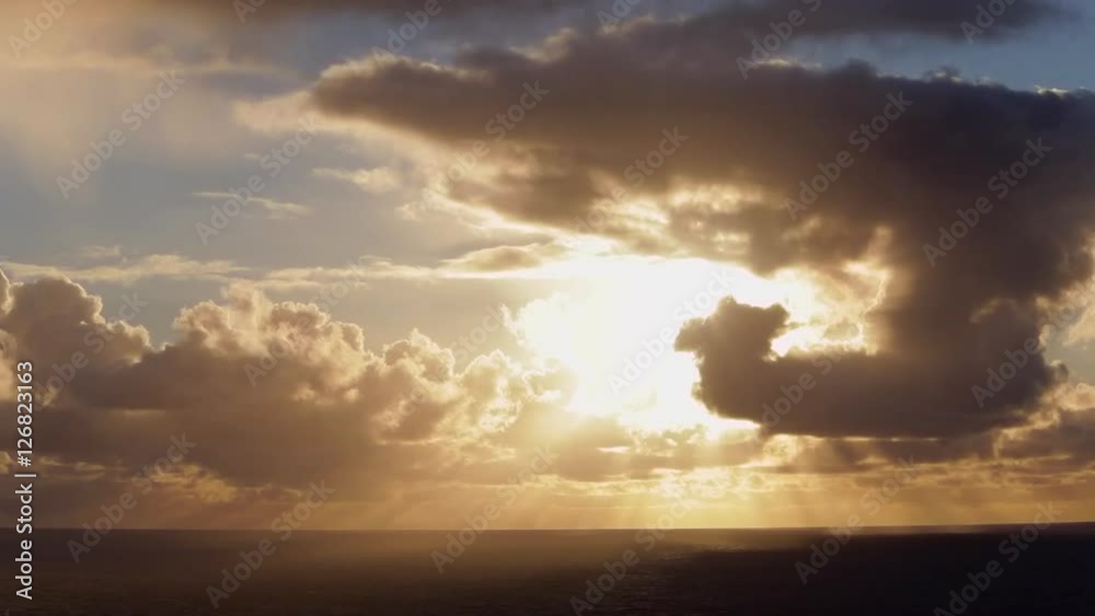 WS TU Rays of sunlight breaking through clouds over ocean WS TU Rays of sunlight breaking through clouds over ocean