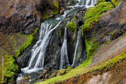Beautiful and powerful icelandic waterfall in summer.   © Alex Levitsky