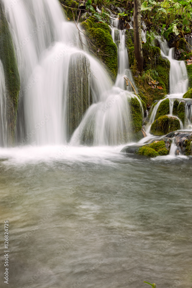 waterfall in deep forest in Plitvice national park