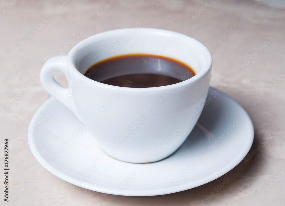 cup of black coffee on the table cup of black coffee on the table