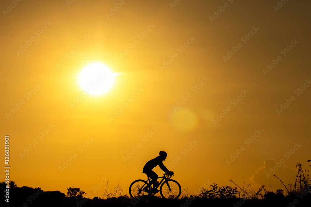 Silhouette of cyclist in motion Silhouette of cyclist in motion