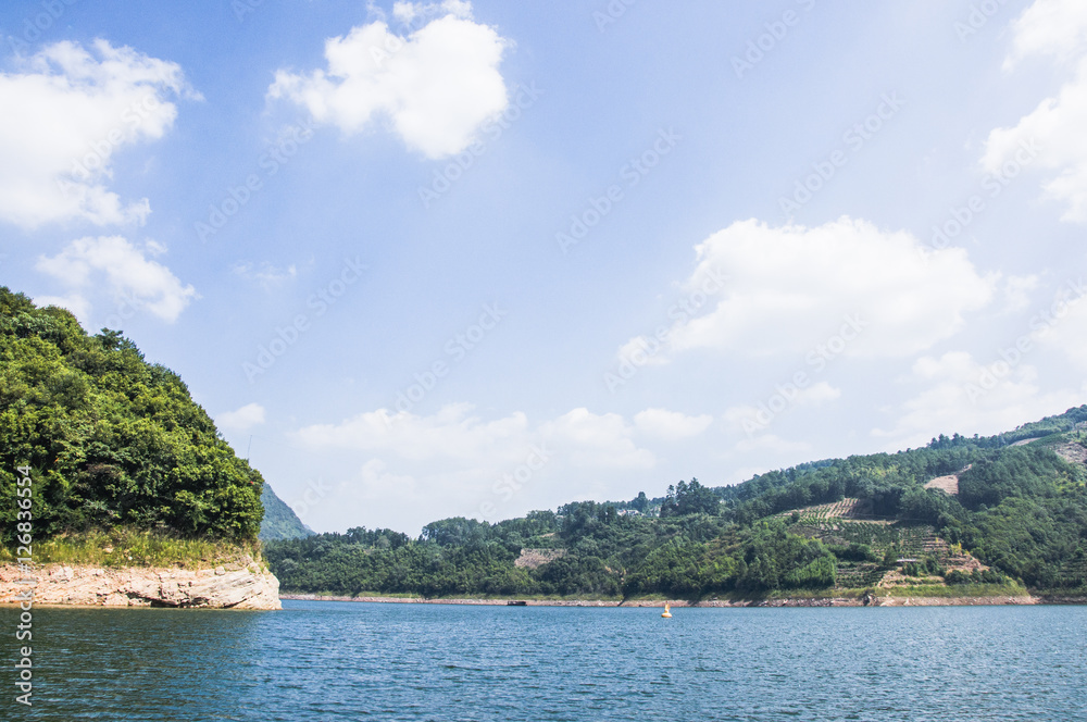 The lake and mountains scenery with blue sky The lake and mountains scenery with blue sky