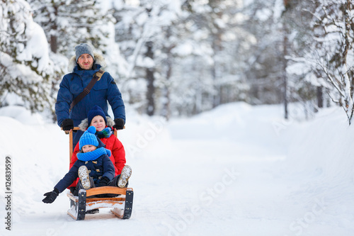 Father and kids outdoors on winter