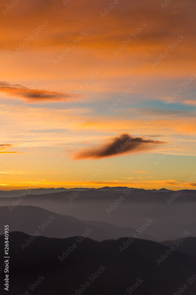 Colorful dramatic sunset sky up in the mountains