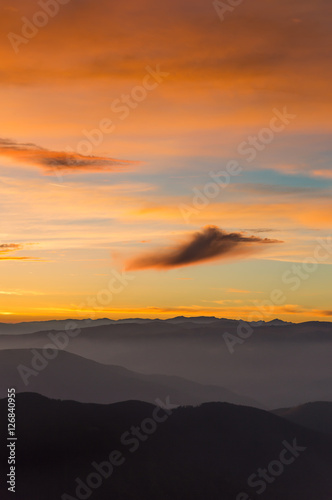 Colorful dramatic sunset sky up in the mountains