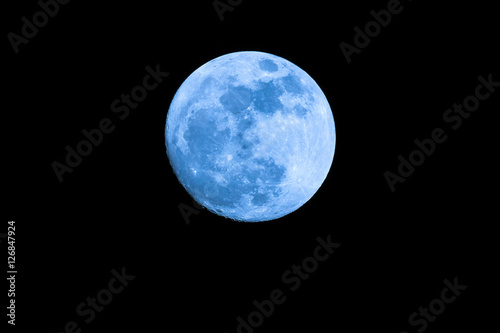 Big Blue Moon on dark night with copy space : shot at 1,260 mm. focal length. No crop image Detailed.
