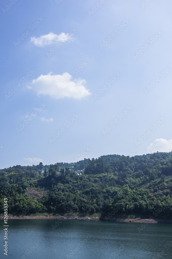 The lake and mountains scenery with blue sky