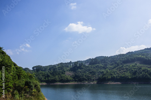 The lake and mountains scenery with blue sky © carl