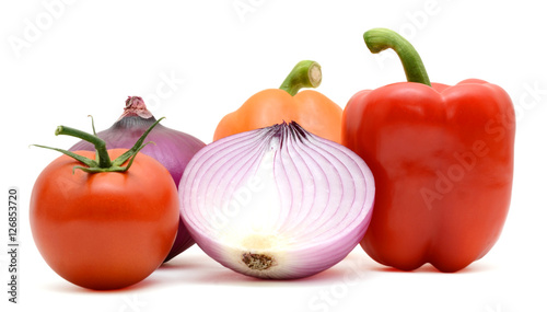 Assorted fresh vegetables: capsicum bell pepper, tomatoes and onions