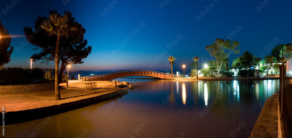 Bridge over the canal at night on the island of Mallorca