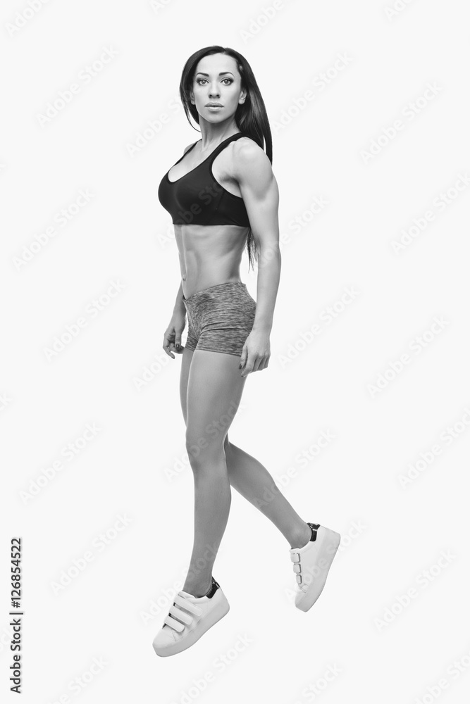 Beautiful fit girl in sport bra and shorts Beautiful fit girl in sport bra and shorts