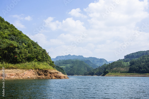 The lake and mountains scenery with blue sky