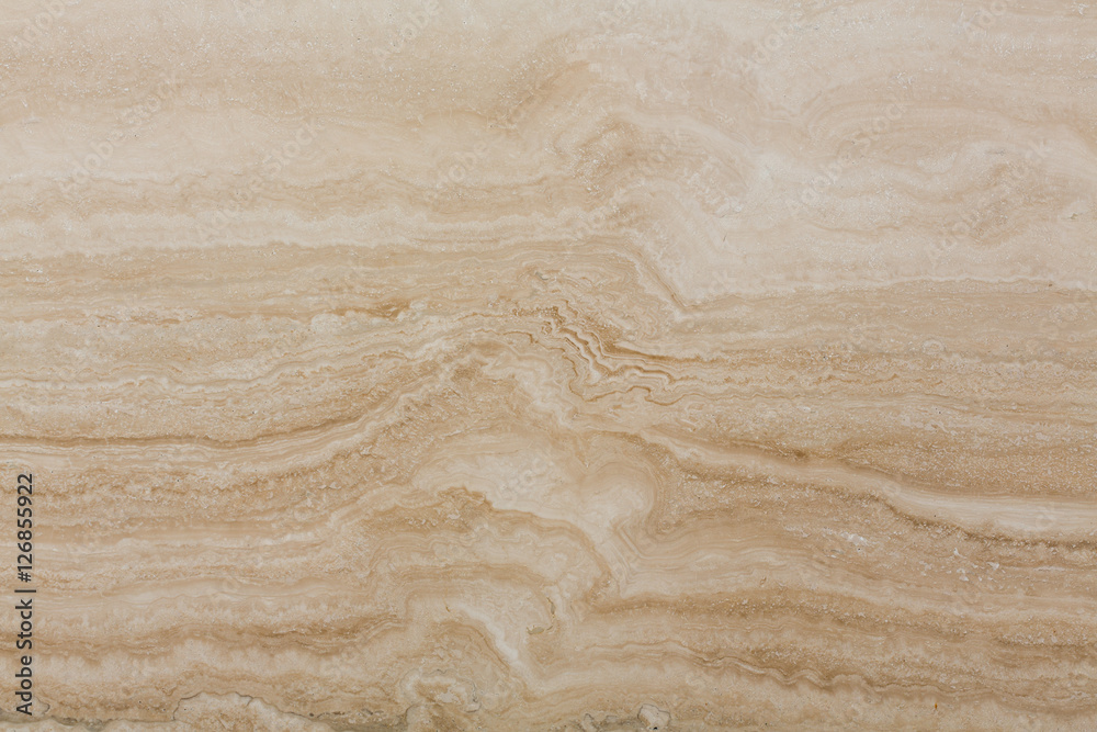 Fototapeta premium Travertine stone floor tile abstract background close up.
