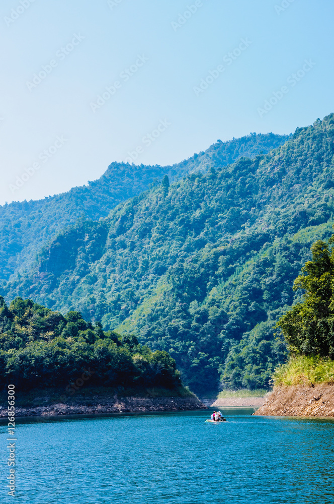 The lake and mountains scenery with blue sky