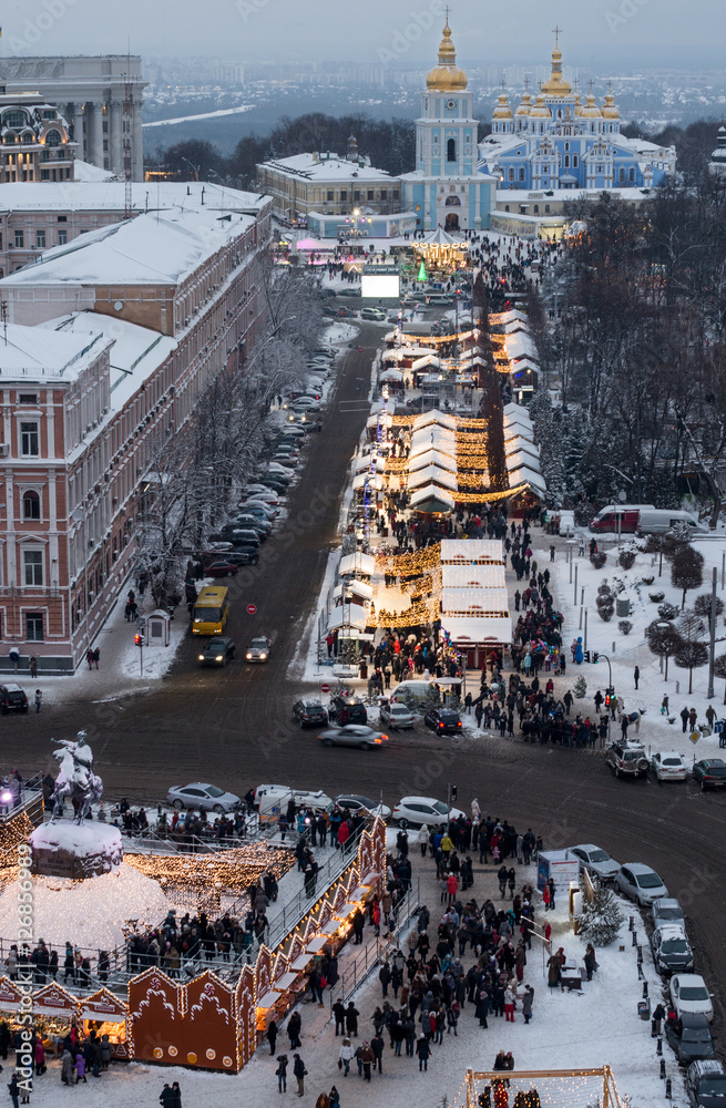 Obraz premium Celebrating New Year and Christmas in the Kyiv center. Square in front of St. Michael's Golden-Domed Monastery. View from above.