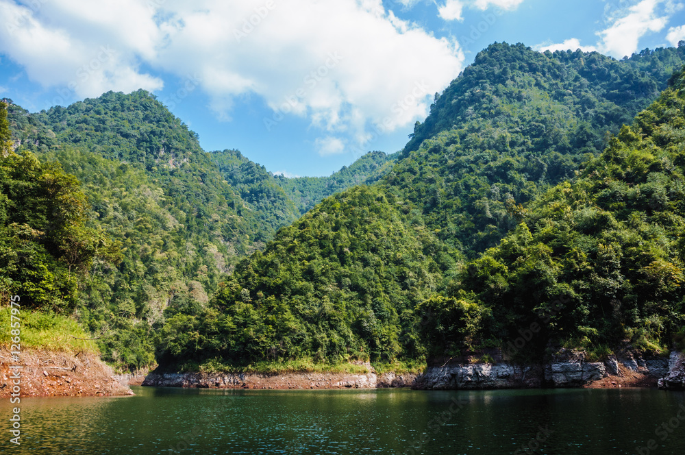 The lake and mountains scenery with blue sky The lake and mountains scenery with blue sky