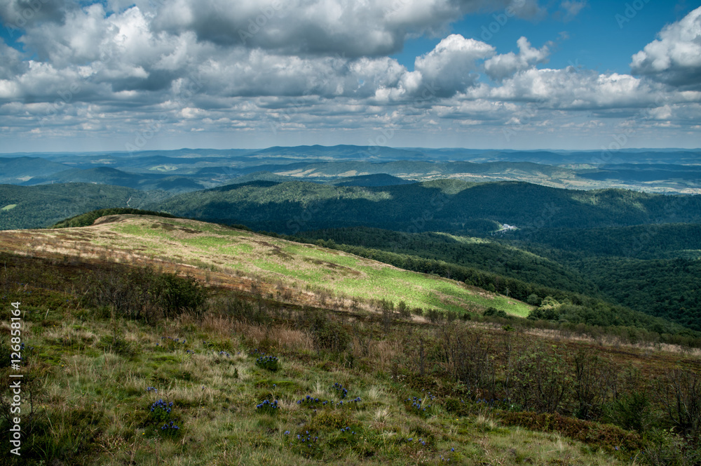 Mountain view, cloudy weather, interesting hills in the background Mountain view, cloudy weather, interesting hills in the background