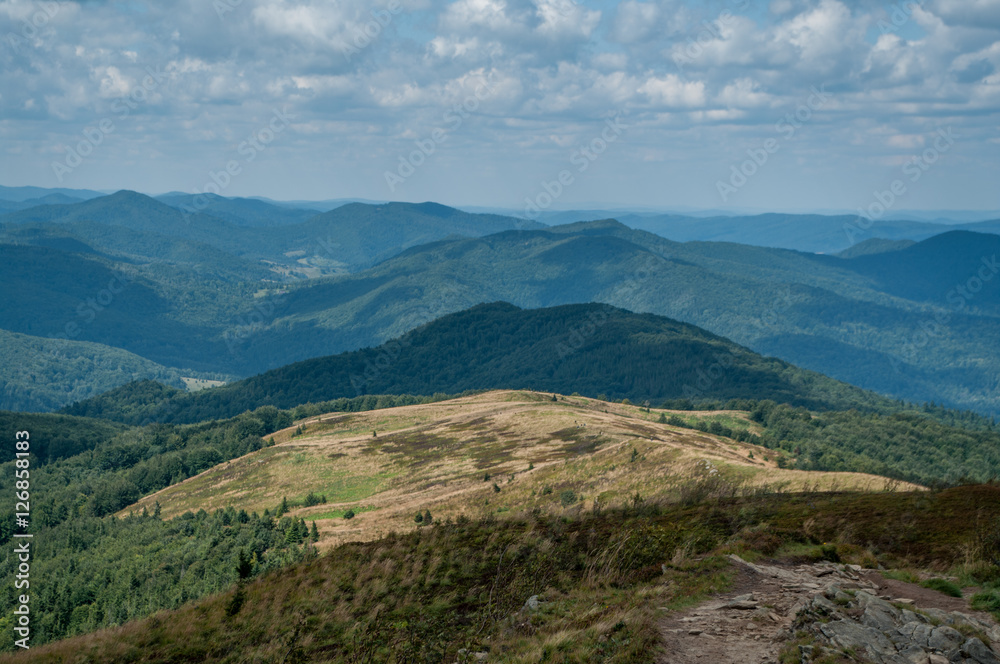 Fototapeta premium Mountain view, cloudy weather, interesting hills in the background