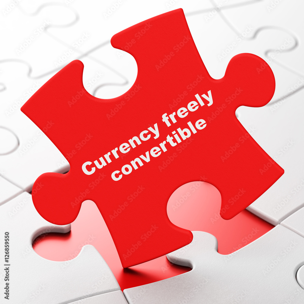 Money concept: Currency freely Convertible on puzzle background