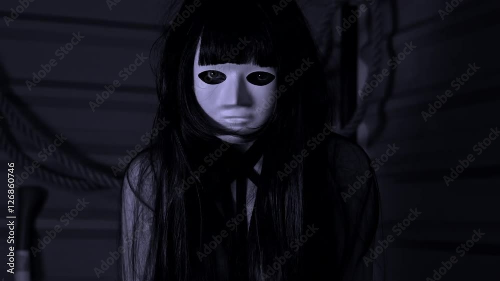 4k Shot of a Scary Woman with Mask Looking at camera and Shaking 4k Shot of a Scary Woman with Mask Looking at camera and Shaking
