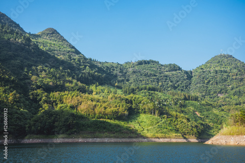The lake and mountains scenery with blue sky © carl