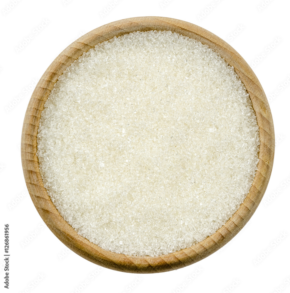 White granulated sugar in bowl isolated White granulated sugar in bowl isolated