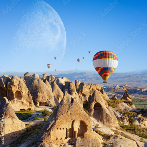 Hot air ballooning in sunrise in Cappadocia, Turkey. Elements of this image furnished by NASA