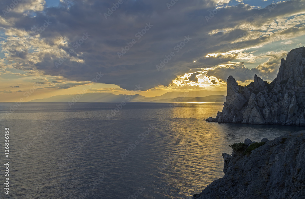 Coastal cliffs at sunset.