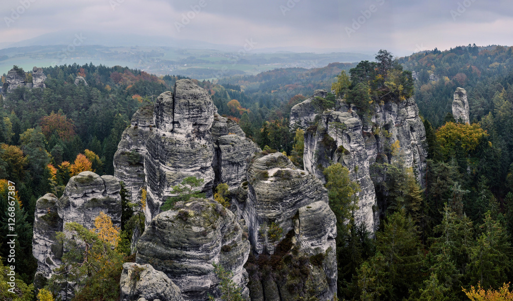 Rocky landscape during the autumn with the colourful trees, Bohemian Paradise, Czech Republic